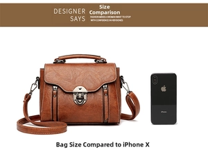 Size comparison between a vintage brown faux leather handbag and a mobile phone