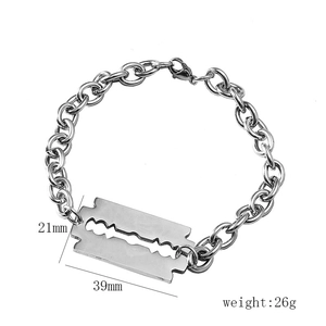 Detail showing razor blade pendant dimensions 39mm by 21mm on stainless steel chain