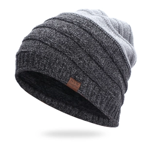 Detail of the warm fleece lining and striped chenille knit texture on this winter hat