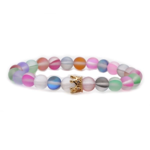 Frosted rainbow moonstone beaded bracelet with a gold crown charm on white background