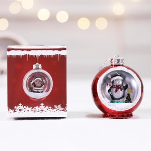 Luminous Christmas ball ornament with penguin scene and red snowflake gift box display