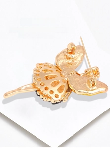 Detailed back view of a ballet dancer brooch showing a dual-use pin and pendant loop