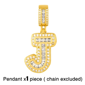 Macro detail of gold letter J pendant with inlaid cubic zirconia and large diamond-set bail