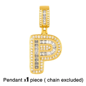 Macro shot of gold letter P pendant with pave set cubic zirconia stones
