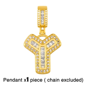 Close-up of golden letter Y pendant with cubic zirconia stones, hip-hop jewelry style