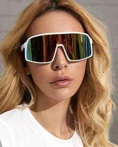 Close-up of stylish white sports sunglasses with rainbow gradient lenses on a model