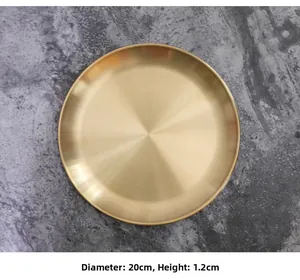 Detailed top view of 20cm gold stainless steel round tray with 1.2cm height and brushed finish
