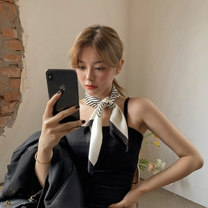 Classic black and white striped 90cm large square silk scarf worn as a stylish necktie