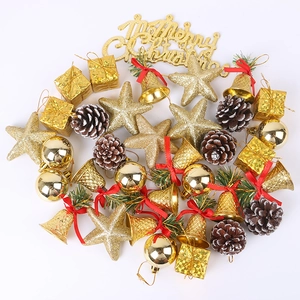 Christmas tree ornaments set with gold gift boxes, pine cones, bells, and Merry Christmas sign
