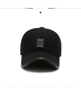 Front view detail of men's winter baseball cap with ear flaps and logo patch