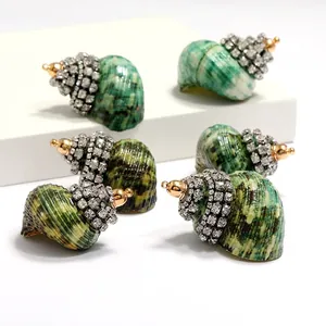 Green spiral conch shell pendants with rhinestones and gold beads for jewelry making