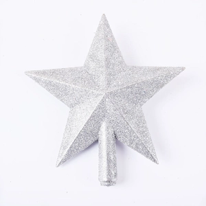 Macro view of a shimmering silver glitter star topper for a Christmas tree decoration