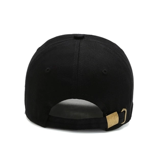 Black cotton baseball cap back view showing adjustable antique bronze metal buckle strap