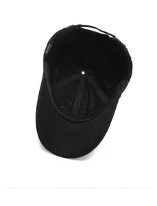 Detail view of the interior 100% cotton lining and sweatband of the black baseball cap
