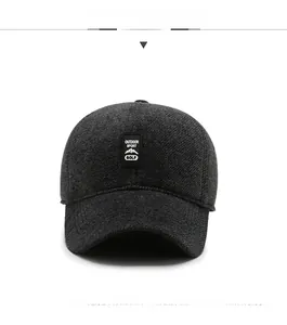 Detailed front view of a thick wool winter baseball cap with mountain outdoor logo patch