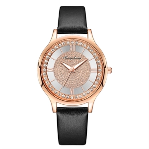 Starry sky rose gold watch with rhinestones, silver sunray dial, and black leather strap