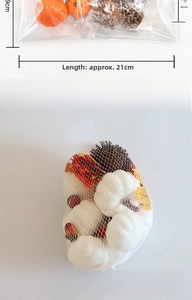 Detail of medium-sized autumn decor set featuring pumpkins and pine cones, 21cm length