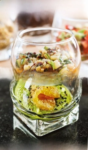 Detail of round lead-free glass dessert bowl with a solid square base and smooth rim