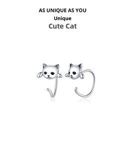 Macro detail of 925 sterling silver cat earrings with black cubic zirconia gemstone eyes