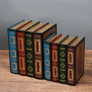 Europäische Vintage-Dekobuchboxen in vier Farben mit Goldmustern für die Wohndekoration