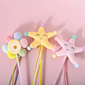 Plush starfish and sunflower cat teaser wand with bells and colorful silk ribbons