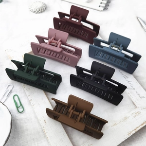 Set of six large matte hair claws in burgundy, navy, and earth tones for elegant styling