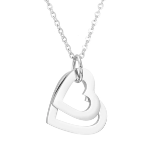 Detail shot of silver double heart pendant necklace with delicate link chain