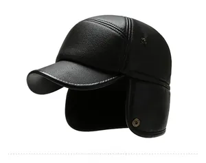 Side view of black winter leather hat for men with ear flaps and fine stitching detail