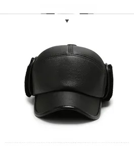 Front view of black leather winter baseball cap with plush ear flaps and stitching details