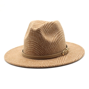 Detail of camel plaid wool fedora hat featuring brown leather band and gold metal buckle