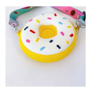 Gros plan du sac en silicone donut jaune pour enfants avec texte Hello et décors
