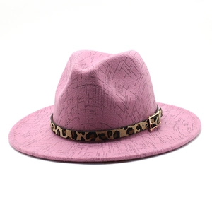 Detailed view of pink wool fedora with geometric texture and leopard print belt buckle