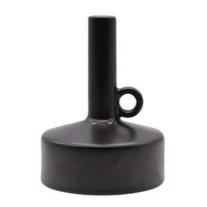 Minimalist matte black ceramic vase with slender neck and decorative ring handle