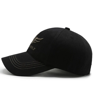 Classic black cotton baseball cap with gold WOLF embroidery and contrast stitching