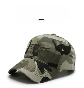 Detailed view of the jungle camouflage baseball cap with embroidered wolf head shield logo