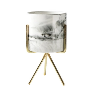 Modern gold iron stand with marble texture ceramic plant pot and elegant metal tripod holder