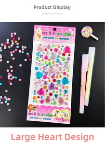 Close-up of colorful heart-shaped crystal rhinestones for DIY phone and album decor
