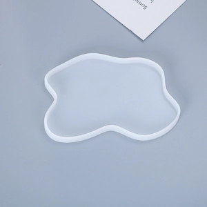 Detailed top view of translucent irregular geometric silicone coaster molds for resin DIY