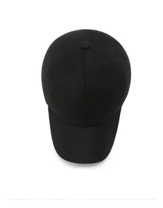 Overhead view of a black winter baseball cap featuring detailed fiber texture and metal logo