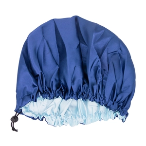Dual-layer satin sleep cap in navy and light blue with adjustable strap and buckle
