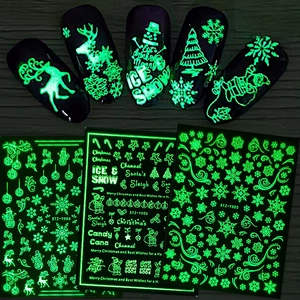 Glow-in-the-dark Christmas nail stickers with 3D snowflakes and reindeer patterns
