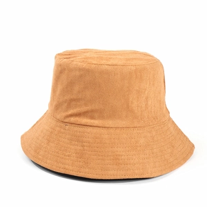 Detail of double-sided faux suede bucket hat with dense parallel stitching on the wide brim