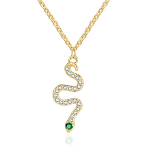 Close-up of gold snake pendant necklace with white zircons and a green gemstone eye