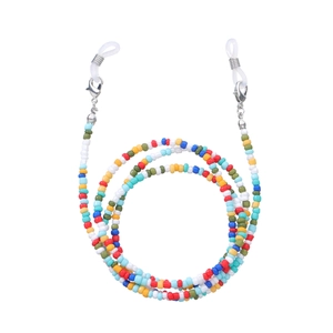 Macro detail of colorful beaded eyeglass chain with secure silver lobster clasps