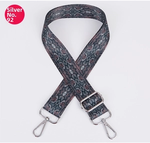 Close-up of snake skin print wide bag strap No.92 with silver metal lobster clasps