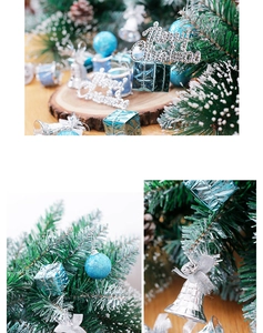 Macro shot of silver and blue Christmas tree ornaments with festive Merry Christmas sign