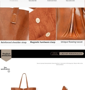 Detail view of brown vintage bucket bag with reinforced handles, magnetic buckle, and tassels