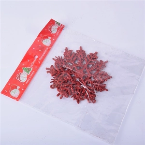Red glitter 10cm snowflake Christmas tree hanging ornament in festive packaging