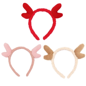 Cute plush reindeer antler headbands in red, pink, and beige for Christmas decor