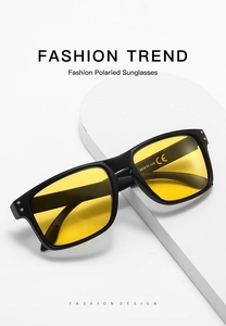 Detail view of polarized sunglasses with yellow lenses and inner temple size markings